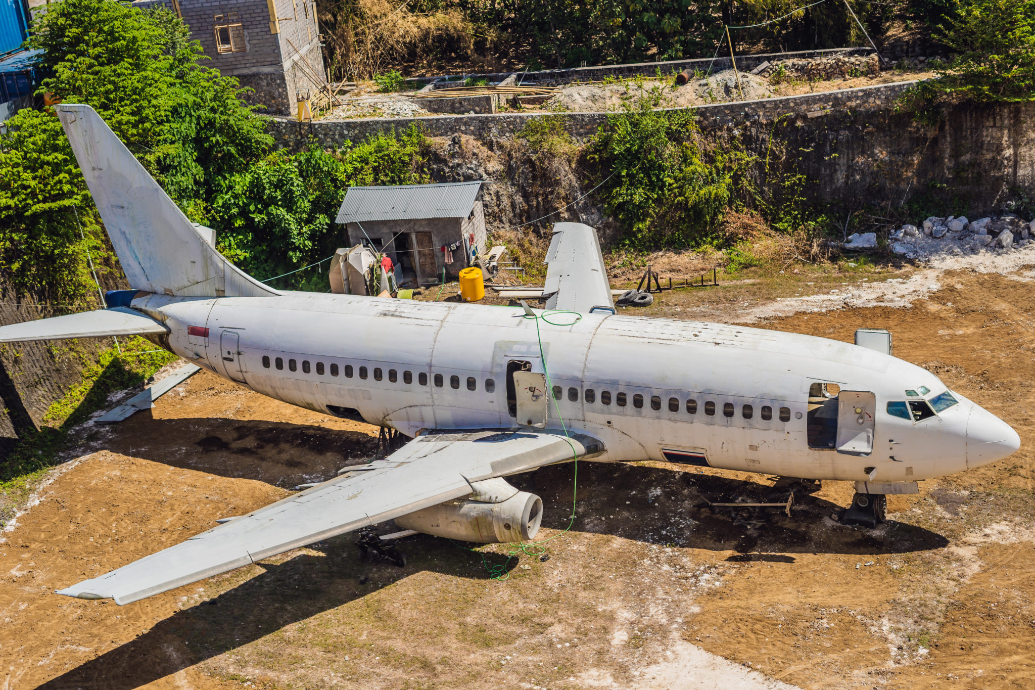 An old passenger aircraft on aviation waste.